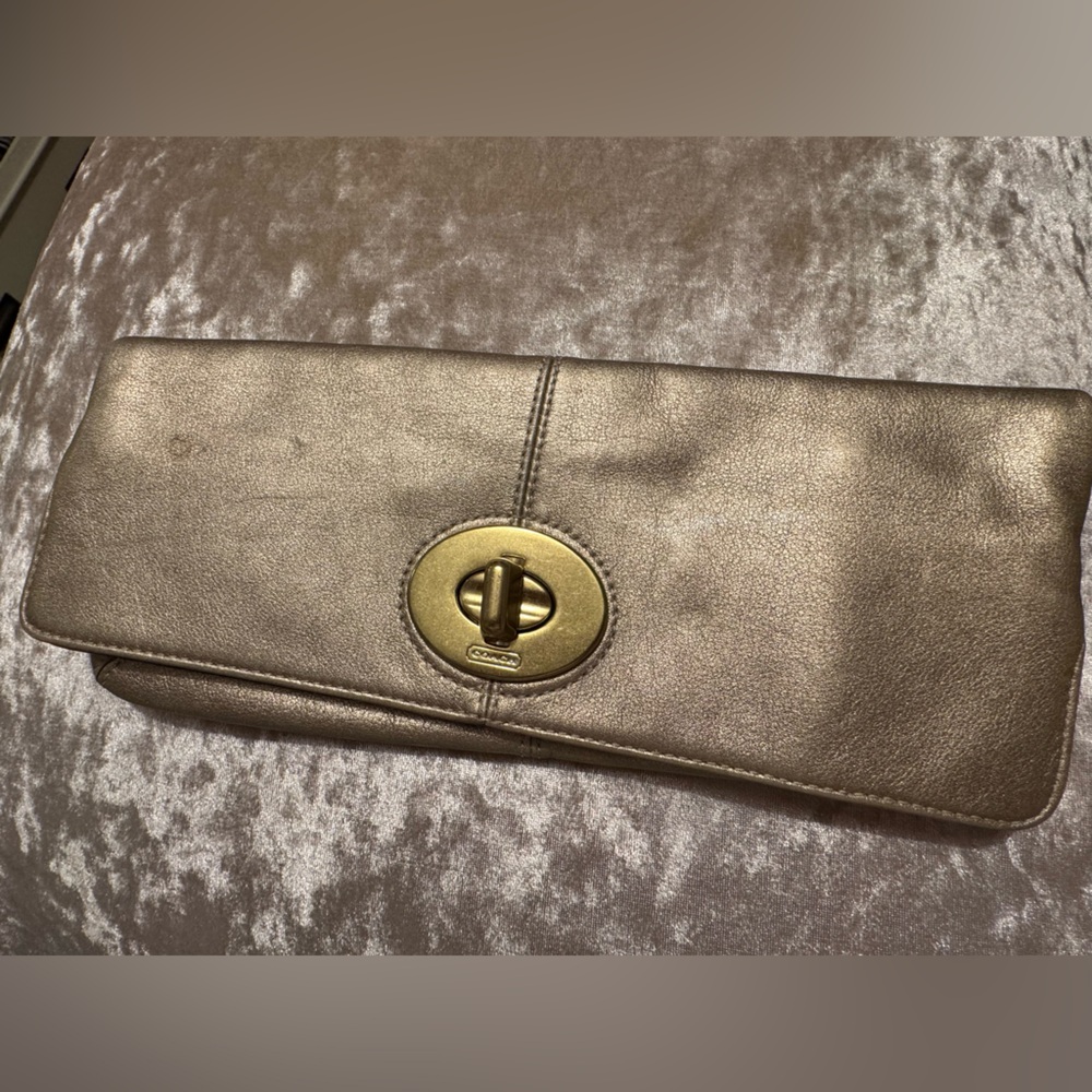 Coach gold clutch